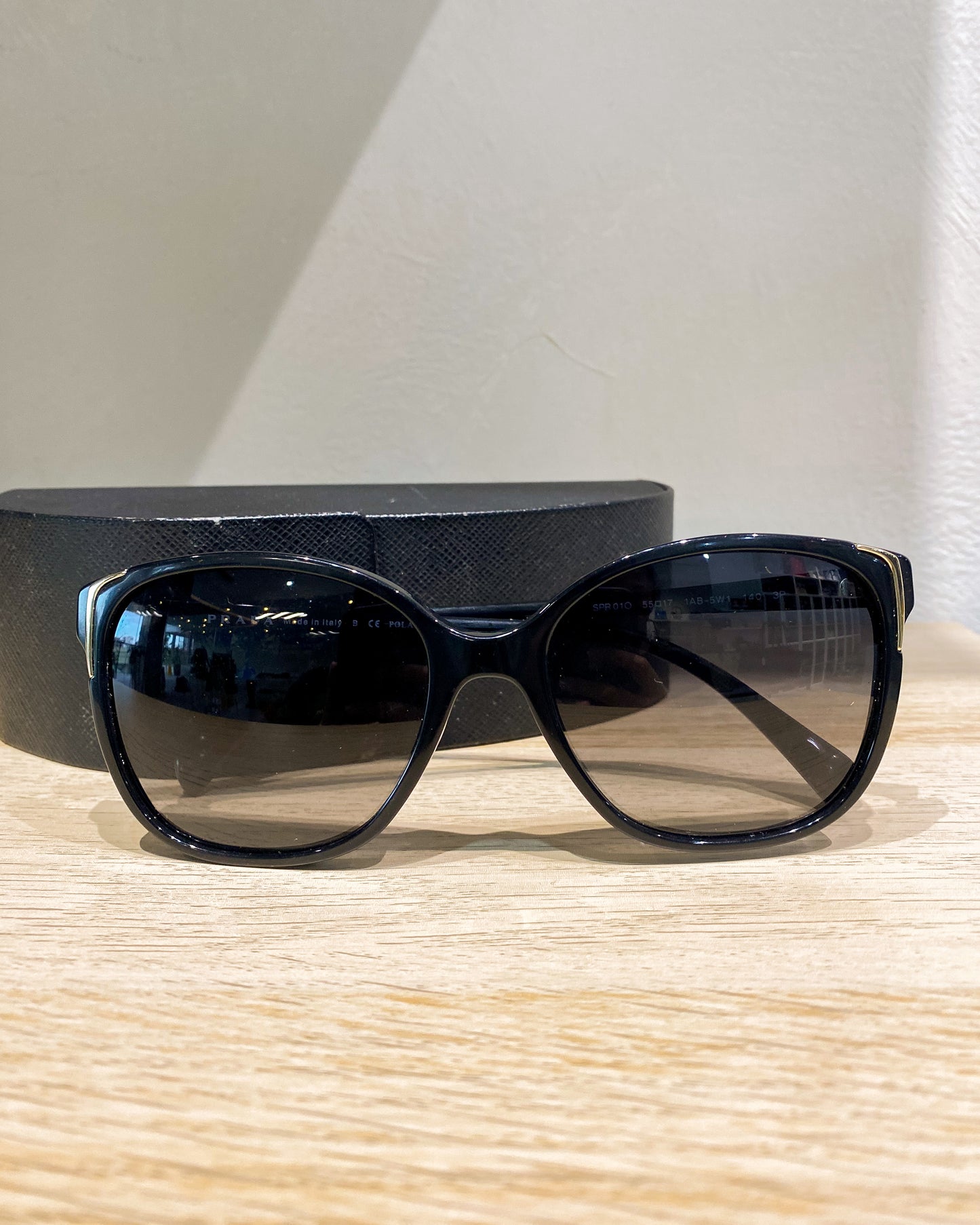 Prada Women’s Black and Tan Sunglasses